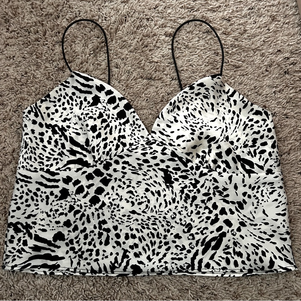 Animal print black and white top. Size small. Not new but nothing wrong with it